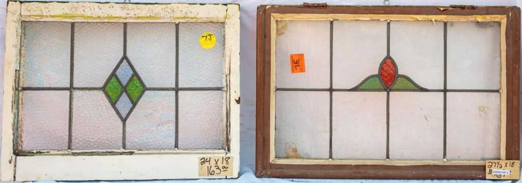 TWO CONTINENTAL STAINED GLASS PANELS: Two Continental stained glass panels with multicolored glass elements. Approximate dimensions: h. 18", w. 27.5" Disclaimer: This is an online court ordered bankruptcy sale. Participating bidders must