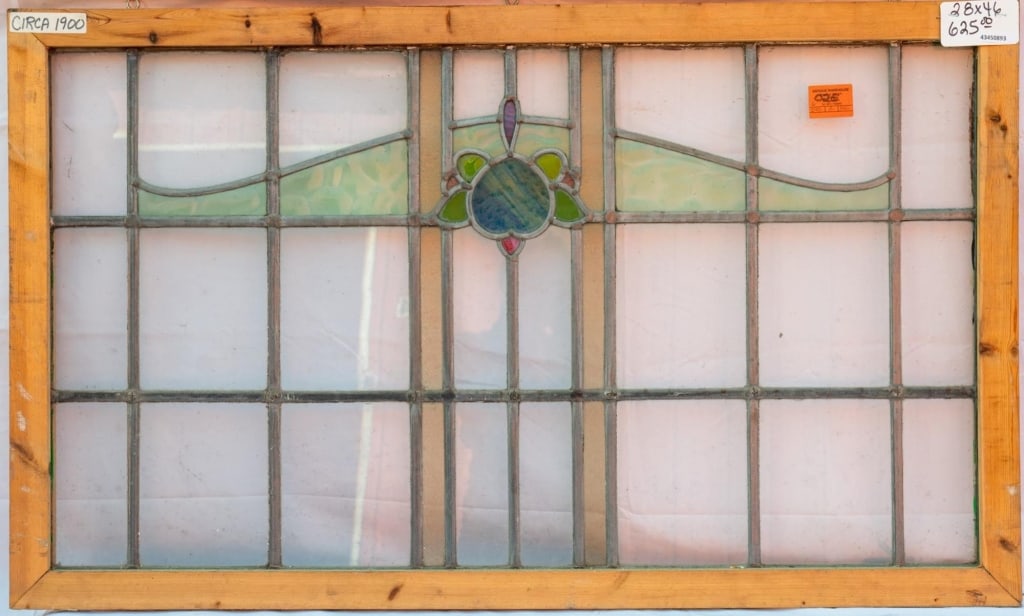FRENCH ART NOUVEAU STAINED GLASS PANEL: French Art Nouveau stained glass panel with opalescent and textured glass details. Approximate dimensions: h. 28", w. 46" Disclaimer: This is an online court ordered bankruptcy sale. Participating bid