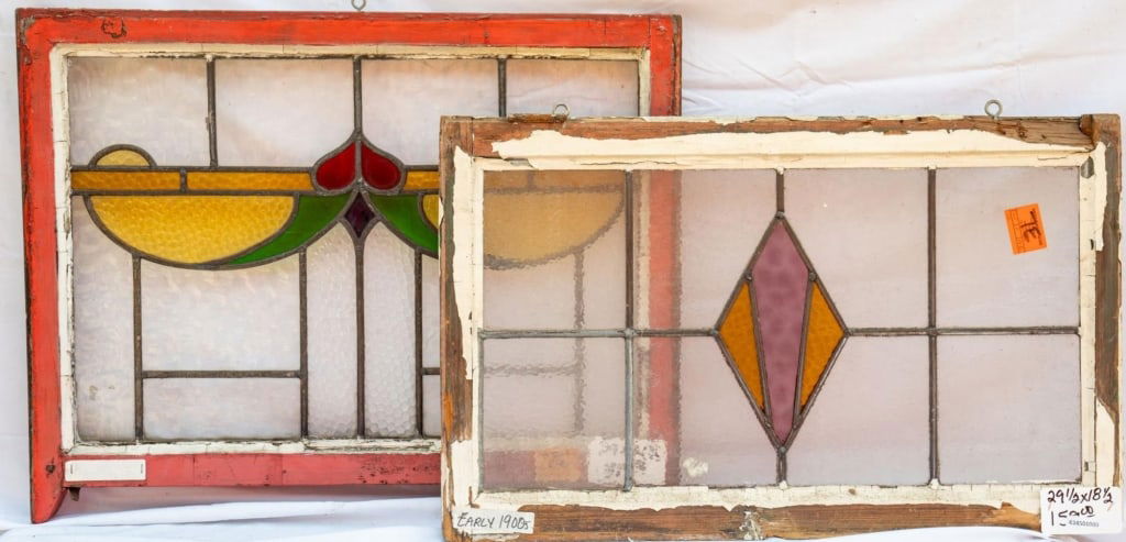 TWO FRENCH STAINED GLASS PANELS: Two French stained glass panels. Approximate dimensions: h. 18.5", w. 21.5" Disclaimer: This is an online court ordered bankruptcy sale. Participating bidders must have a credit card on file with Live