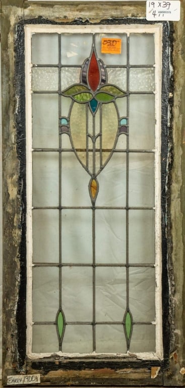 FRENCH ART NOUVEAU STAINED GLASS PANEL: French Art Nouveau stained glass panel with floral medallion, colorless leaded glass panels, and purple wispy glass accents. Approximate dimensions: h. 39", w. 19" Disclaimer: This is an online court