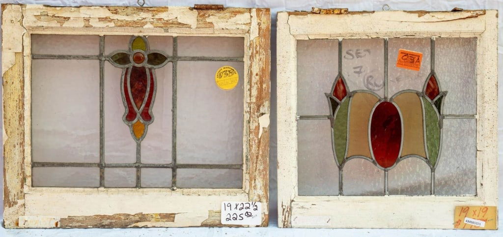 TWO FRENCH STAINED GLASS PANELS: Two French stained glass panels, one with red jeweled detail. Approximate dimensions: h. 19", w. 22.5" Disclaimer: This is an online court ordered bankruptcy sale. Participating bidders must have a cr