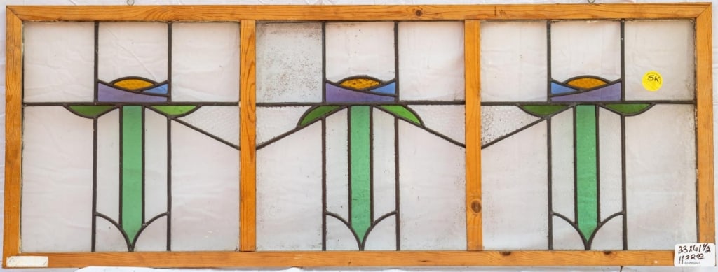 FRENCH ART NOUVEAU STAINED GLASS PANEL: French Art Nouveau stained glass panel with symmetrical floral details set within colorless leaded glass panels. Approximate dimensions: h. 23", w. 61.5" Disclaimer: This is an online court ordered ba