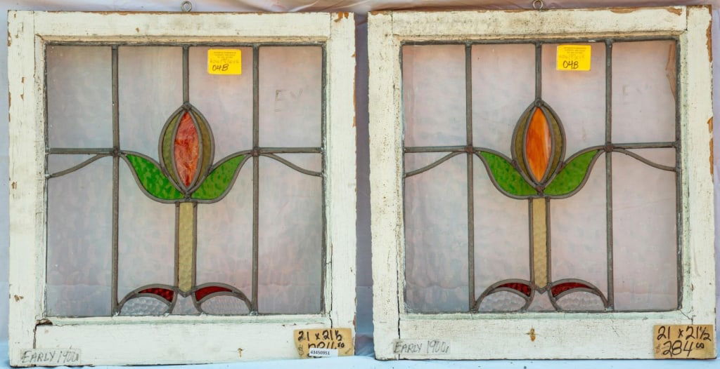 PAIR OF FRENCH ART NOUVEAU STAINED GLASS PANELS: Pair of French Art Nouveau stained glass panels with a floral motif. Approximate dimensions: h. 21.5", w. 21" Disclaimer: This is an online court ordered bankruptcy sale. Participating bidders must ha