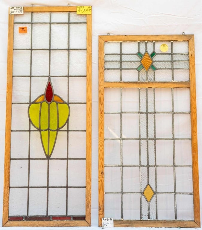 TWO CONTINENTAL STAINED GLASS PANELS: Two Continental stained glass panels. Approximate dimensions: h. 51.5", w. 20" Disclaimer: This is an online court ordered bankruptcy sale. Participating bidders must have a credit card on file with L