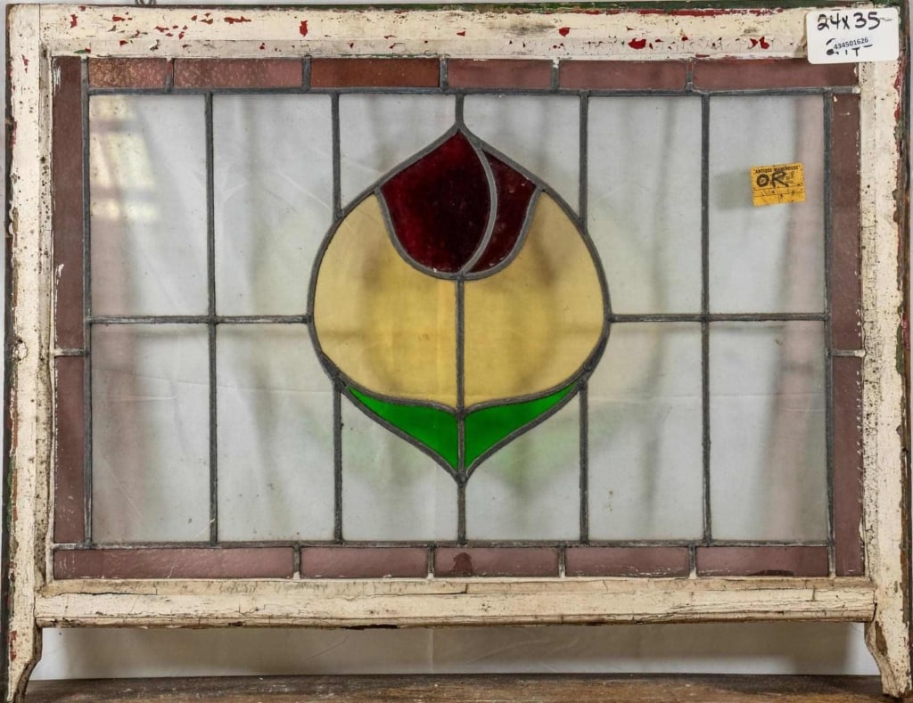 FRENCH ART NOUVEAU STAINED GLASS PANEL: French Art Nouveau stained glass panel with red, green, and amber floral medallion. Approximate dimensions: h. 24", w. 35" Disclaimer: This is an online court ordered bankruptcy sale. Participating bi