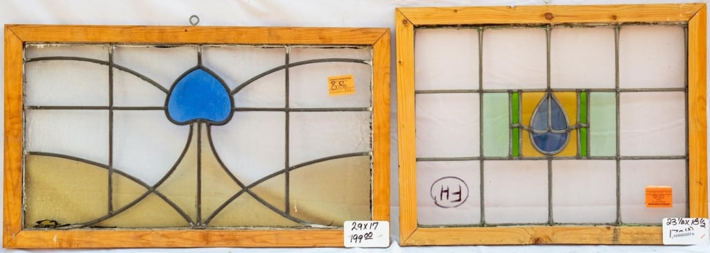 TWO FRENCH STAINED GLASS PANELS: Two French stained glass panels composed of understated, minimalistic stained glass elements. Approximate dimensions: h. 23.5", w. 31.5" Disclaimer: This is an online court ordered bankruptcy sale. Pa