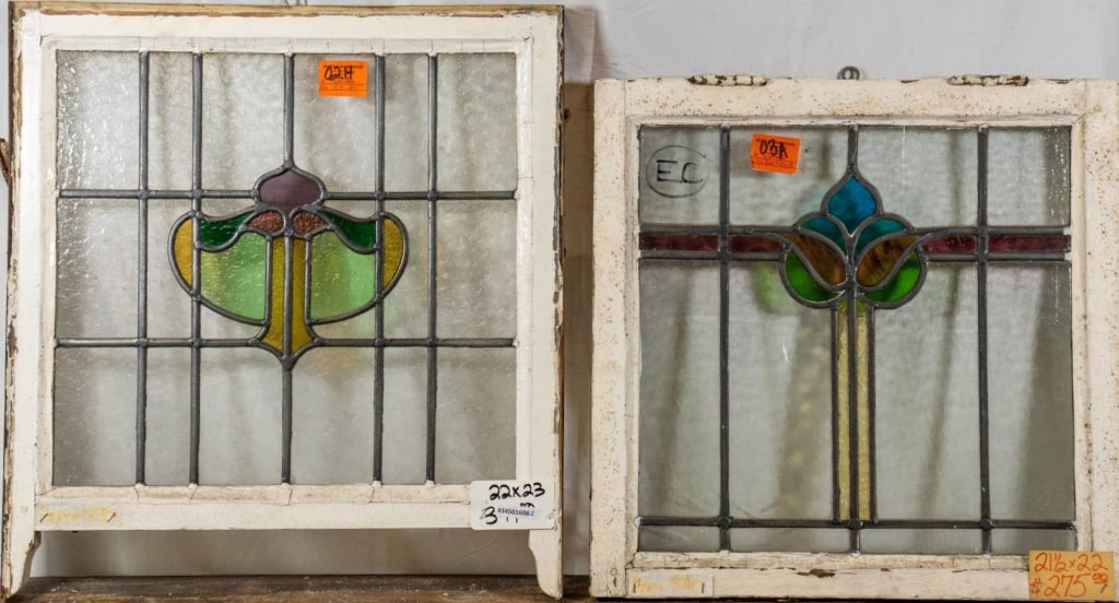 TWO FRENCH ART NOUVEAU STAINED GLASS PANELS: Two French Art Nouveau stained glass panels with multicolored accents. Approximate dimensions: h. 22", w. 23" Disclaimer: This is an online court ordered bankruptcy sale. Participating bidders must ha