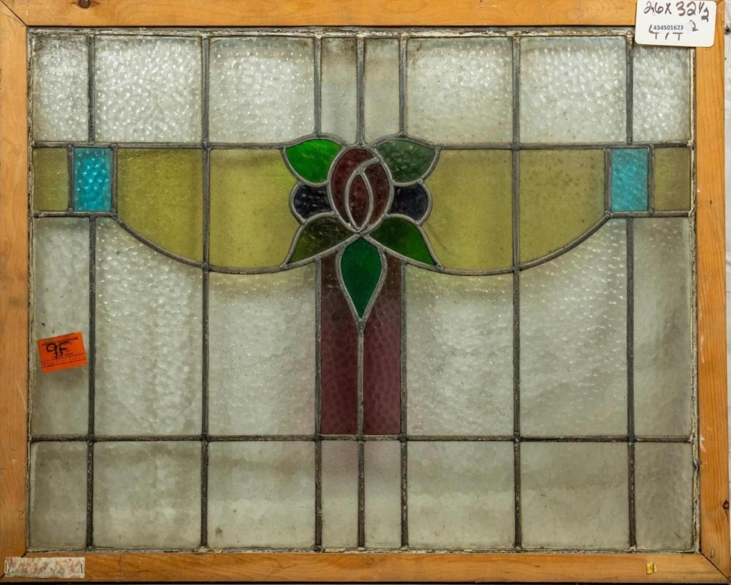 FRENCH ART NOUVEAU STAINED GLASS PANEL: French Art Nouveau stained glass panel with floral medallion and amber, purple, and blue accents. Approximate dimensions: h. 26", w. 32.5" Disclaimer: This is an online court ordered bankruptcy sale.