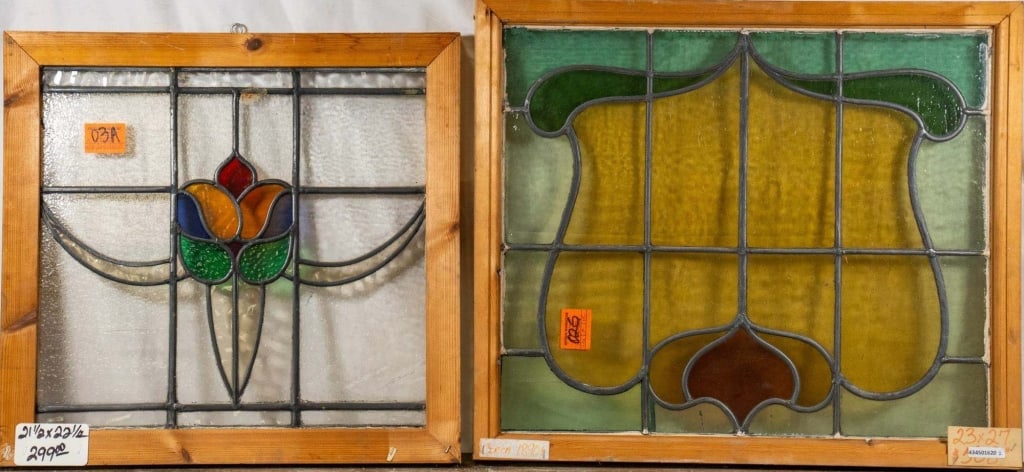 TWO CONTINENTAL STAINED GLASS PANELS: Two Continental stained glass panels with multicolored accents. Approximate dimensions: h. 23", w. 27" Disclaimer: This is an online court ordered bankruptcy sale. Participating bidders must have a cr