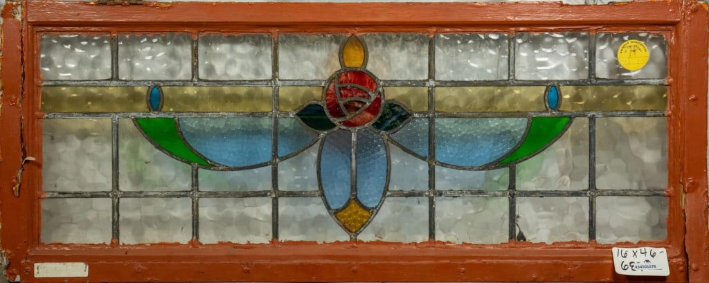 FRENCH ART NOUVEAU STAINED GLASS PANEL: French Art Nouveau stained glass panel with floral medallion. Approximate dimensions: h. 16", w. 40" Disclaimer: This is an online court ordered bankruptcy sale. Participating bidders must have a cred