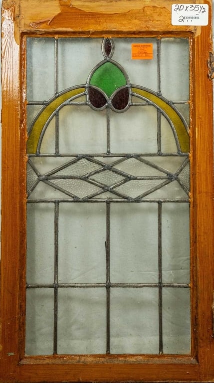 ANTIQUE CONTINENTAL STAINED GLASS PANEL: Antique Continental stained glass panel with textured red, amber, and green stained glass accents. Approximate dimensions: h. 35.5", w. 20" Disclaimer: This is an online court ordered bankruptcy sale.