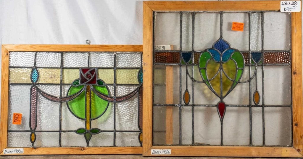 TWO FRENCH ART NOUVEAU STAINED GLASS PANELS: wo French Art Nouveau stained glass panels with floral and ribbon motif medallions. Approximate dimensions: h. 28", w. 28" Disclaimer: This is an online court ordered bankruptcy sale. Participating bi