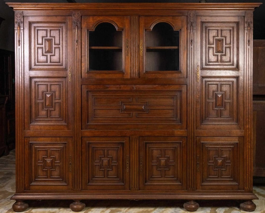 MONUMENTAL FRENCH RENAISSANCE REVIVAL OAK PANELED: Monumental French Renaissance Revival oak paneled desk with bun feet and inset carved panels. Approximate dimensions: h. 72", w. 95", d. 19" Disclaimer: This is an online court ordered bankruptcy sale