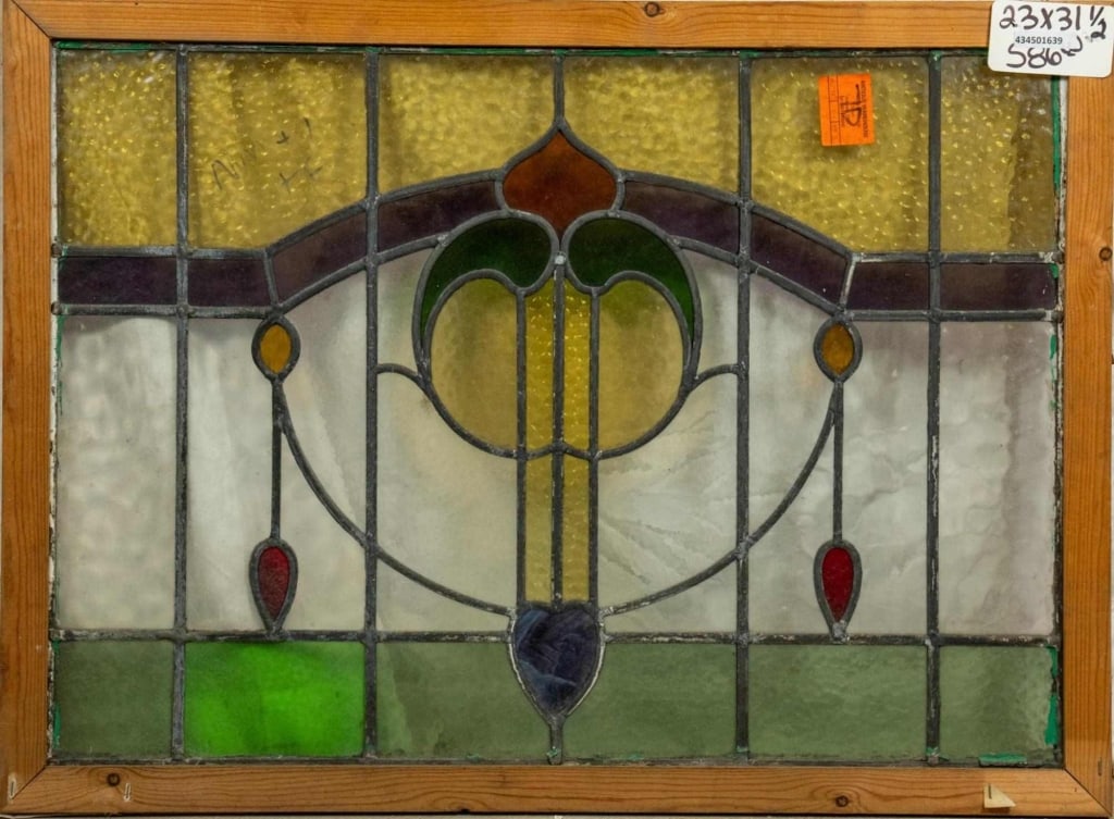 FRENCH ART NOUVEAU STAINED GLASS PANEL: French Art Nouveau stained glass panel with wispy purple glass accent. Approximate dimensions: h. 23", w. 31.5" Disclaimer: This is an online court ordered bankruptcy sale. Participating bidders must
