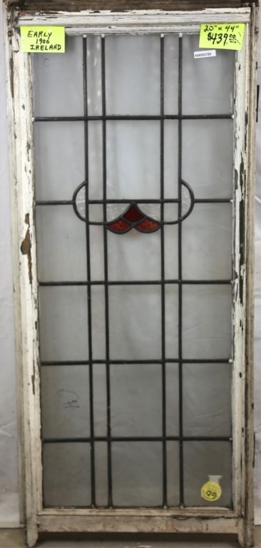 IRISH STAINED GLASS PANEL: Irish stained glass panel. Approximate dimensions: h. 44", w. 20" Disclaimer: This is an online court ordered bankruptcy sale. Participating bidders must have a credit card on file with Live Auctionee