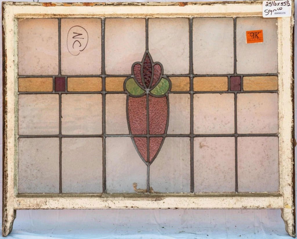 FRENCH ART NOUVEAU STAINED GLASS PANEL: French Art Nouveau stained glass panel with a central red and green floral medallion. Approximate dimensions: h. 25.5", w. 35.5" Disclaimer: This is an online court ordered bankruptcy sale. Participat