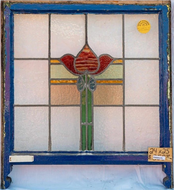 FRENCH ART NOUVEAU STAINED GLASS PANEL: French Art Nouveau stained glass panel with a red tulip medallion. Approximate dimensions: h. 24", w. 25" Disclaimer: This is an online court ordered bankruptcy sale. Participating bidders must have a
