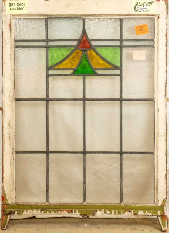 ENGLISH ART DECO STAINED GLASS PANEL: English Art Deco stained glass panel. Approximate dimensions: h. 34", w. 26.5" Disclaimer: This is an online court ordered bankruptcy sale. Participating bidders must have a credit card on file with L