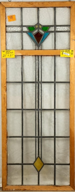 ENGLISH ART DECO STAINED GLASS PANEL: English Art Deco stained glass panel with amber, blue, green, and red stained glass accents. Approximate dimensions: h. 51", w. 20" Disclaimer: This is an online court ordered bankruptcy sale. Partici