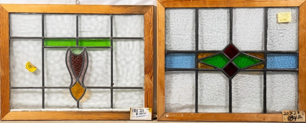 TWO CONTINENTAL STAINED GLASS PANELS: Two Continental stained glass panels with textured accents. Approximate dimensions: h. 18", w. 24" Disclaimer: This is an online court ordered bankruptcy sale. Participating bidders must have a credit