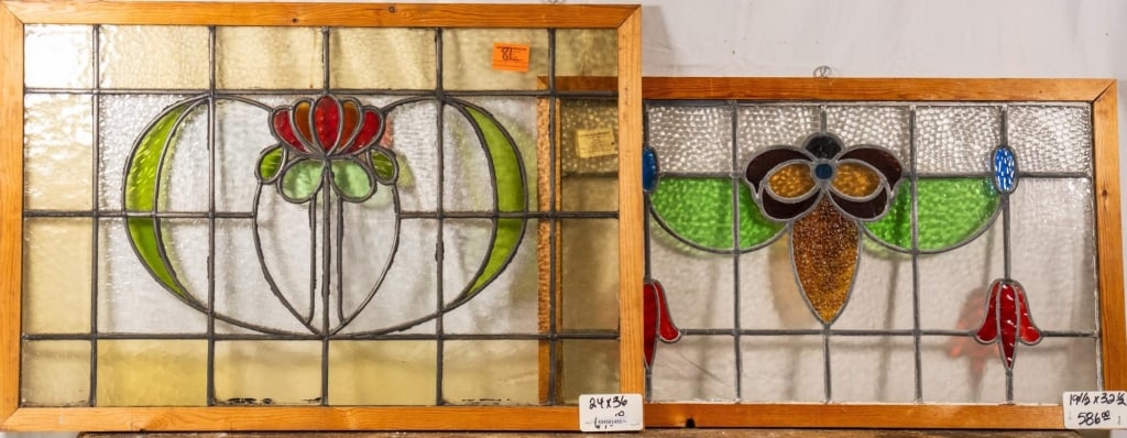 TWO FRENCH ART NOUVEAU STAINED GLASS PANELS: Two French Art Nouveau stained glass panels with a floral motif. Approximate dimensions: h. 24", w. 36" Disclaimer: This is an online court ordered bankruptcy sale. Participating bidders must have a c