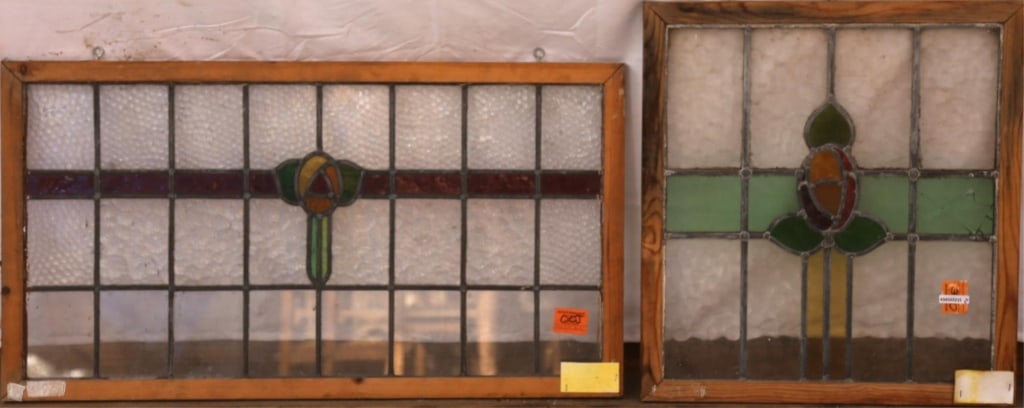 TWO ANTIQUE CONTINENTAL STAINED GLASS PANELS: Two antique Continental stained glass panels with multicolored stained glass floral medallions. Approximate dimensions: h. 20.5", w. 37" Disclaimer: This is an online court ordered bankruptcy sale. Pa