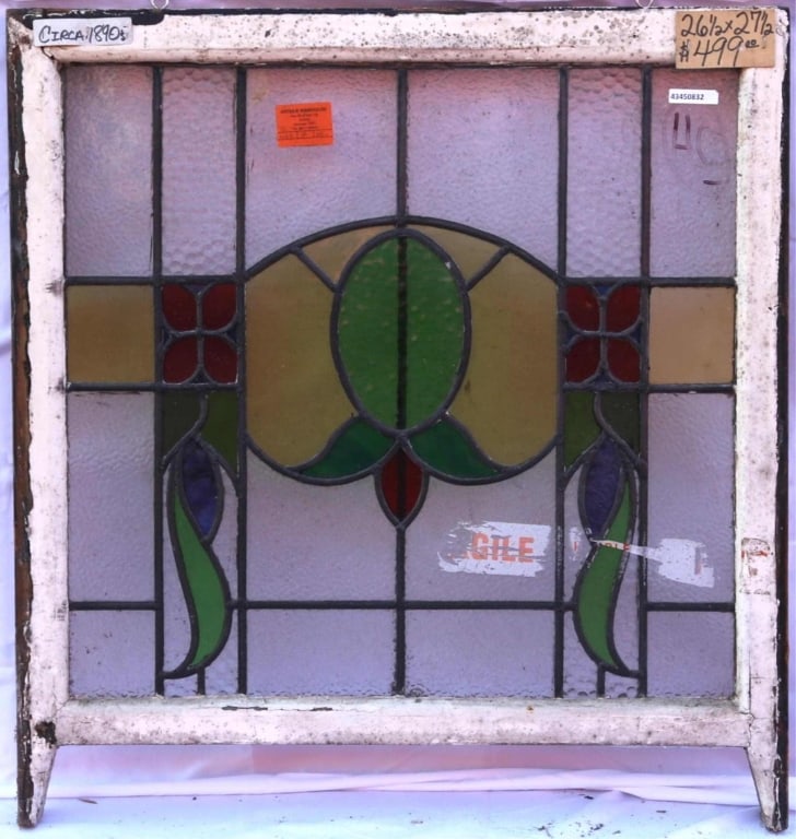 ANTIQUE STAINED GLASS WINDOW: Antique stained glass window. Approximate dimensions: h. 27.5", w 26.5" Disclaimer: This is an online court ordered bankruptcy sale. Participating bidders must have a credit card on file with Live Auc