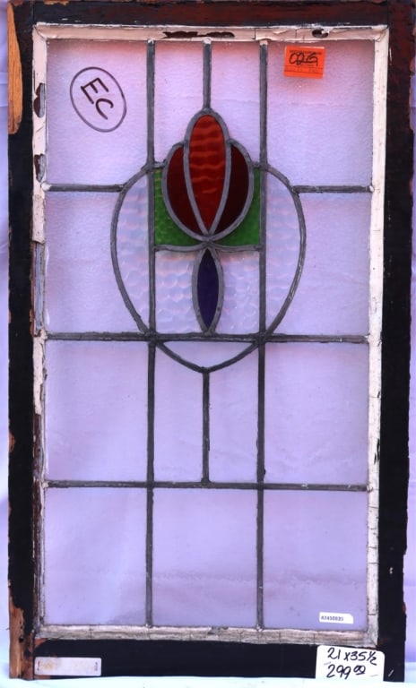 ANTIQUE STAINED GLASS WINDOW: Antique stained glass window. Approximate dimensions: h. 35.5", w. 21" Disclaimer: This is an online court ordered bankruptcy sale. Participating bidders must have a credit card on file with Live Auct