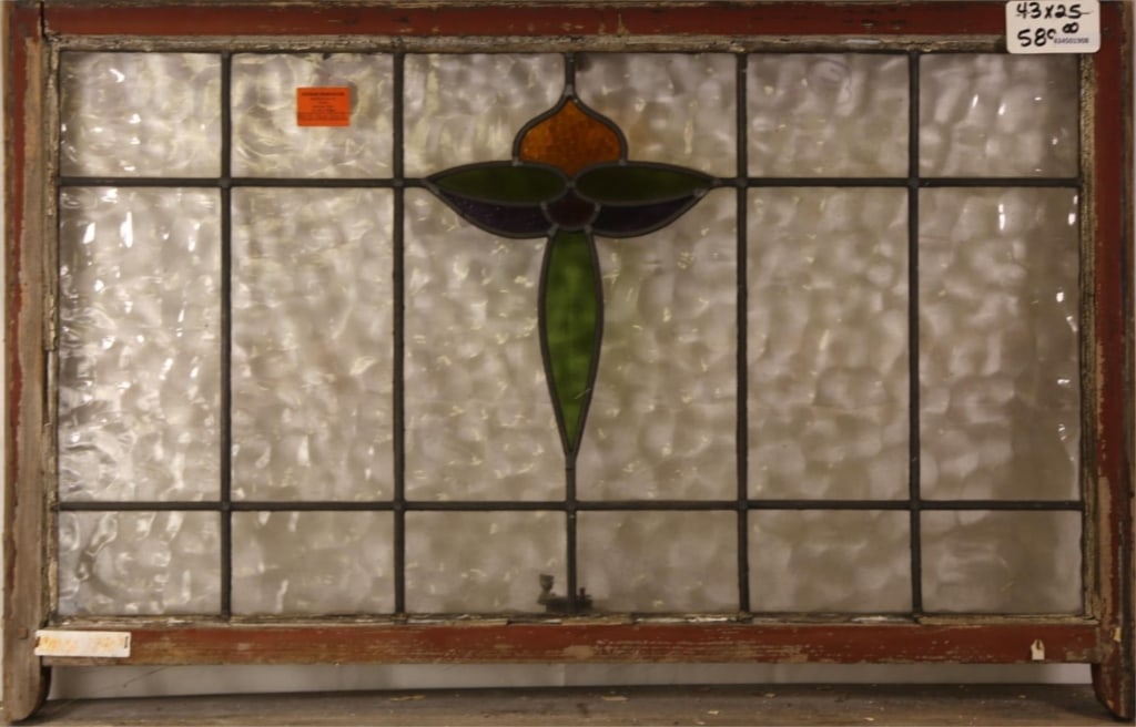 ANTIQUE CONTINENTAL STAINED GLASS PANEL: Antique Continental stained glass panel with floral medallion. Approximate dimensions: h. 25", w. 43" Disclaimer: This is an online court ordered bankruptcy sale. Participating bidders must have a cre