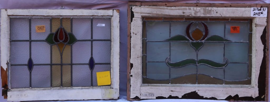 TWO ANTIQUE STAINED GLASS WINDOWS: Two antique stained glass windows. Approximate dimensions: h. 24.5", w. 31" Disclaimer: This is an online court ordered bankruptcy sale. Participating bidders must have a credit card on file with Live
