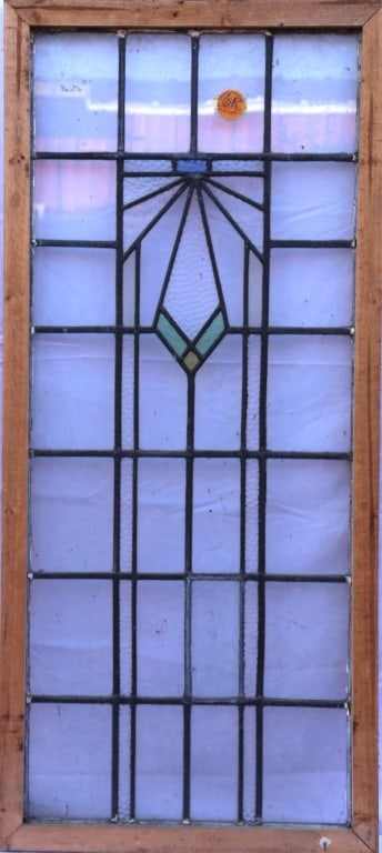 ANTIQUE STAINED GLASS WINDOW: Antique stained glass window. Approximate dimensions: h. 51", w. 22.5" Disclaimer: This is an online court ordered bankruptcy sale. Participating bidders must have a credit card on file with Live Auct