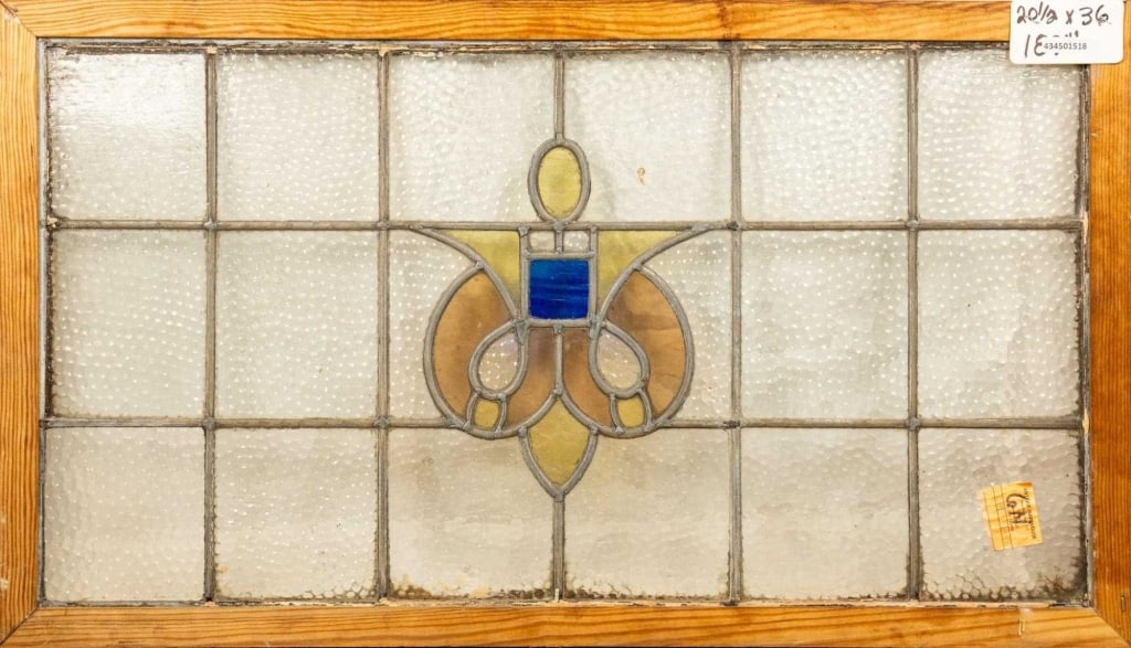 CONTINENTAL STAINED GLASS PANEL: Continental stained glass panel. Approximate dimensions: h. 20.5", w. 36" Disclaimer: This is an online court ordered bankruptcy sale. Participating bidders must have a credit card on file with Live A