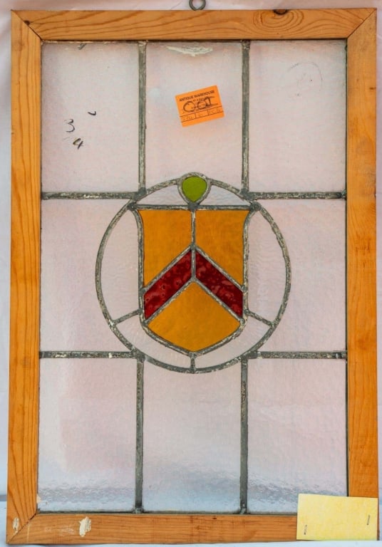 FRENCH ART DECO STAINED GLASS PANEL: French Art Deco stained glass panel with leaded colorless glass and amber and red stained glass details. Approximate dimensions: h. 24", w. 16.5" Disclaimer: This is an online court ordered bankruptcy