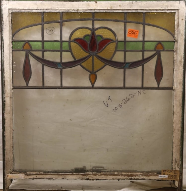 CONTINENTAL ART NOUVEAU STAINED GLASS PANEL: Continental Art Nouveau stained glass panel with heart-shaped floral medallion and purple ribbon details. Approximate dimensions: h. 35", w. 34.5" Disclaimer: This is an online court ordered bankruptc