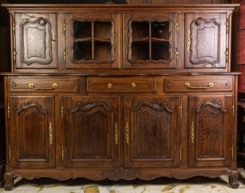 FRENCH OAK VITRINE SIDEBOARD: French oak vitrine sideboard with cabriole legs, elongated pulls, barrel hinges, and carved apron. Approximate dimensions: h. 61", w. 78", d. 21" Disclaimer: This is an online court ordered bankruptcy