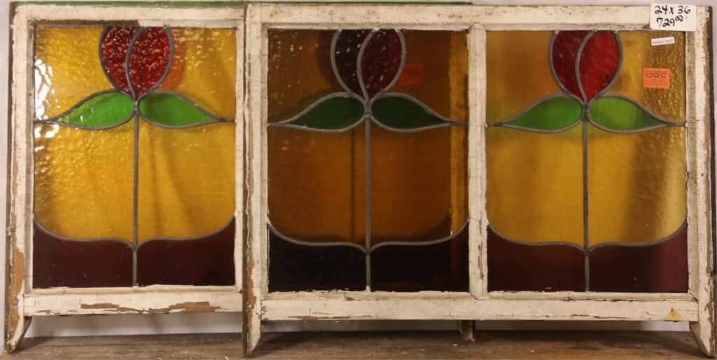 PAIR OF CONTINENTAL ART NOUVEAU STAINED GLASS PANE: Pair of Continental Art Nouveau stained glass panels with floral motif. Approximate dimensions: h. 36", w. 24" Disclaimer: This is an online court ordered bankruptcy sale. Participating bidders must h