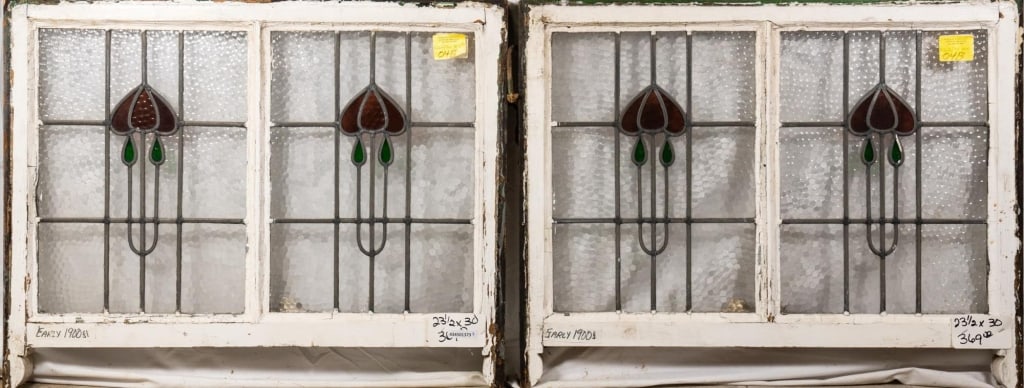 PAIR OF FRENCH ART NOUVEAU SDOUBLE STAINED GLASS P: Pair of French Nouveau stained glass panels with a floral motif. Approximate dimensions: h. 23.5", w. 30" Disclaimer: This is an online court ordered bankruptcy sale. Participating bidders must have a