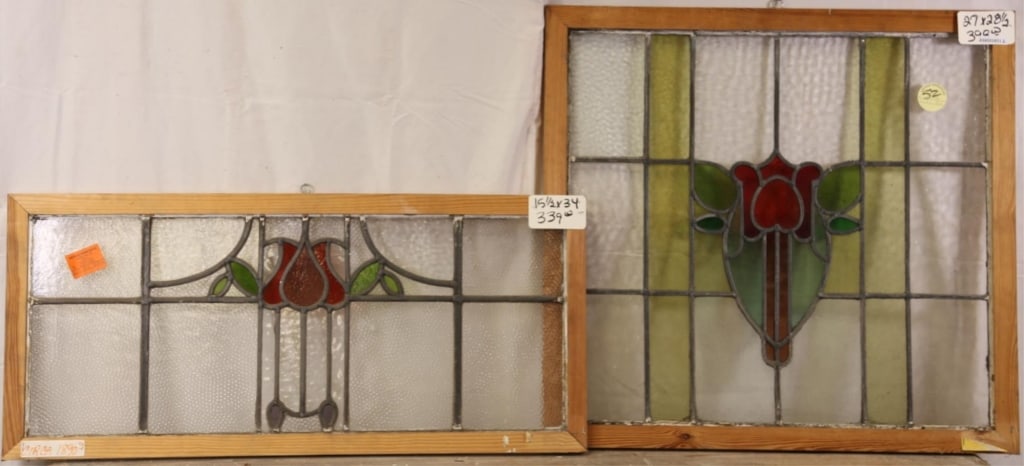 TWO FRENCH ART NOUVEAU STAINED GLASS PANELS: Two French Art Nouveau stained glass panels with floral medallions. Approximate dimensions: h. 27", w. 28.5" Disclaimer: This is an online court ordered bankruptcy sale. Participating bidders must hav