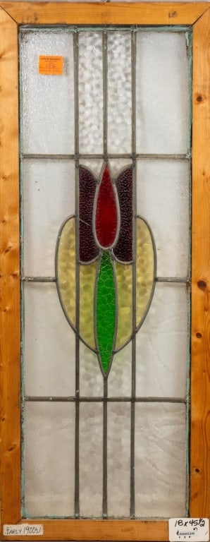 FRENCH ART NOUVEAU STAINED GLASS PANEL: French Art Nouveau stained glass panel with a floral medallion and textured colorless leaded glass panels. Approximate dimensions: h. 45.5", w. 18" Disclaimer: This is an online court ordered bankrupt