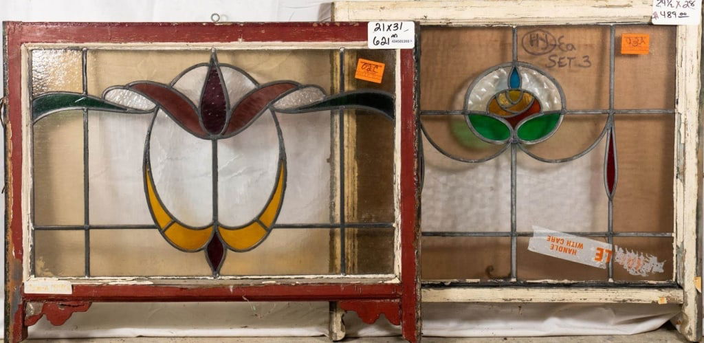 TWO FRENCH ART NOUVEAU STAINED GLASS PANELS: Two French Art Nouveau stained glass panels with floral motif. Approximate dimensions: h. 21", w. 31" Disclaimer: This is an online court ordered bankruptcy sale. Participating bidders must have a cre