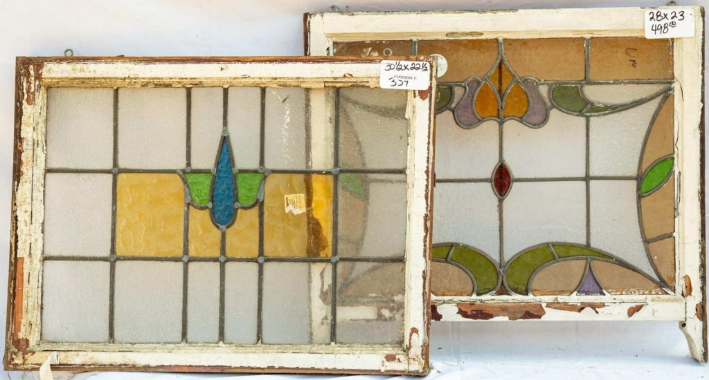 TWO FRENCH STAINED GLASS PANELS: Two French stained glass panels with geometric multicolored stained glass medallion. Approximate dimensions: h. 22.5", w. 30.5" Disclaimer: This is an online court ordered bankruptcy sale. Participati