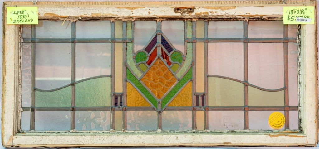 FRENCH ART DECO STAINED GLASS PANEL: French Art Deco stained glass panel. Approximate dimensions: h. 18", w. 38.5" Disclaimer: This is an online court ordered bankruptcy sale. Participating bidders must have a credit card on file with Li