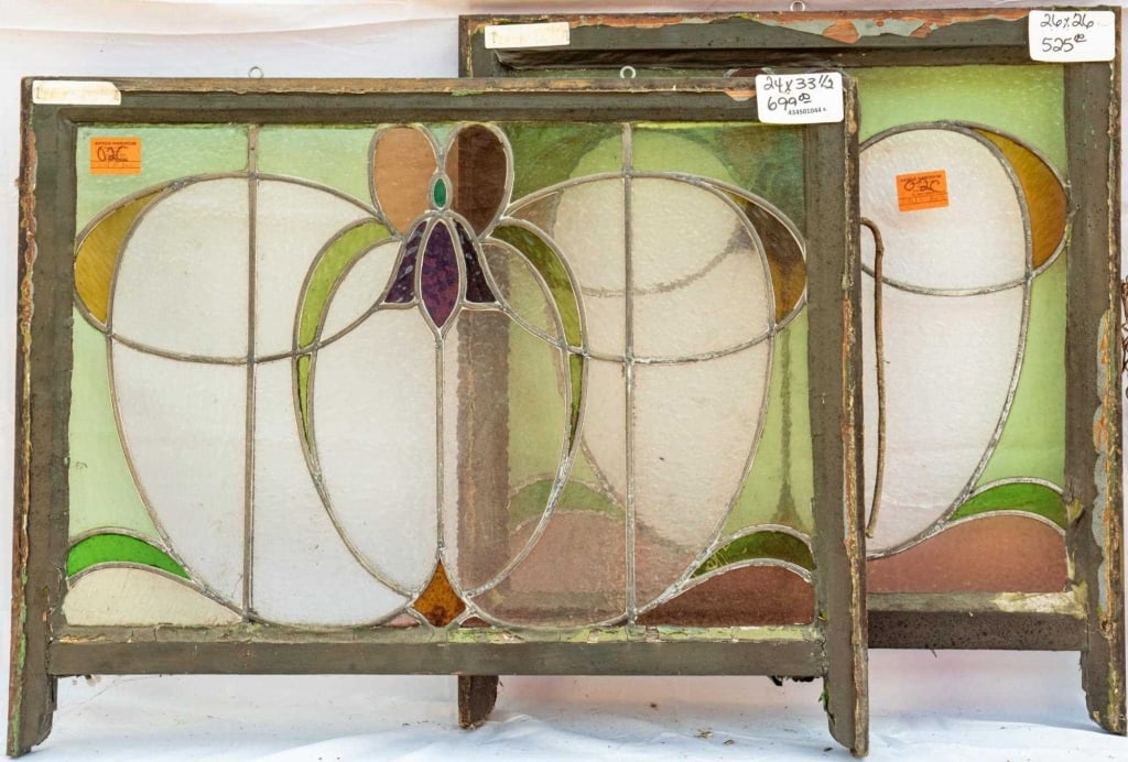 TWO FRENCH ART NOUVEAU STAINED GLASS PANELS: Two French Art Nouveau stained glass panels with a floral motif. Approximate dimensions: h. 24", w. 33.5" Disclaimer: This is an online court ordered bankruptcy sale. Participating bidders must have a