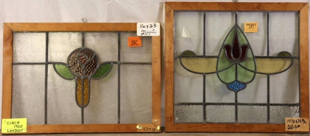 TWO ENGLISH ART NOUVEAU STAINED GLASS PANELS: Two English Art Nouveau stained glass panels with floral medallions and textured glass elements. Approximate dimensions: h. 19.5", w. 21.5" Disclaimer: This is an online court ordered bankruptcy sale.