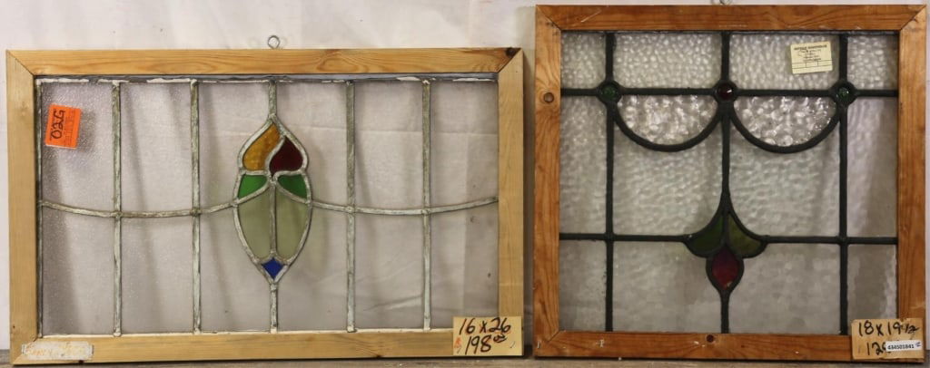 TWO ANTIQUE CONTINENTAL STAINED GLASS PANELS: Two antique Continental stained glass panels, one with red jeweled detail and floral motif. Approximate dimensions: h. 18", w. 19.5" Disclaimer: This is an online court ordered bankruptcy sale. Partic