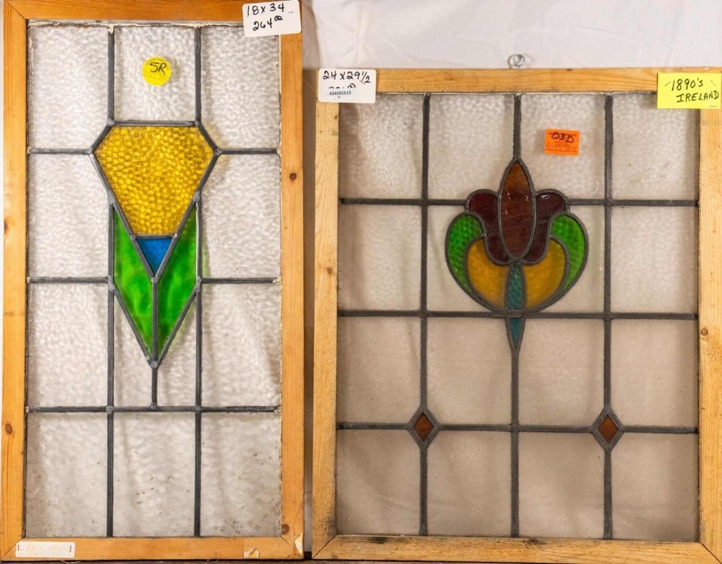 TWO CONTINENTAL STAINED GLASS PANELS: Two Continental stained glass panels with floral and geometric medallions. Approximate dimensions: h. 34", w. 18" Disclaimer: This is an online court ordered bankruptcy sale. Participating bidders mus
