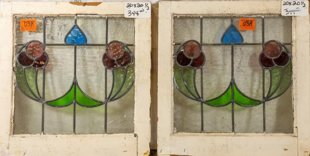 PAIR OF FRENCH ART NOUVEAU STAINED GLASS PANELS: Pair of French Art Nouveau stained glass panels with floral motif and colorless leaded glass panels. Approximate dimensions: h. 20", w. 20.5" Disclaimer: This is an online court ordered bankruptcy sal