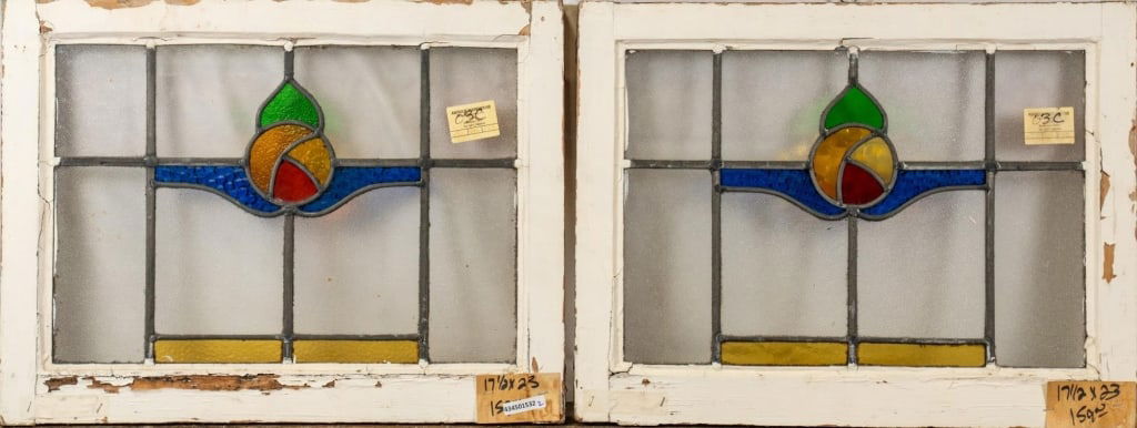 PAIR OF FRENCH ART NOUVEAU STAINED GLASS PANELS: Pair of French Art Nouveau stained glass panels with floral medallions. Approximate dimensions: h. 17.5", w. 23" Disclaimer: This is an online court ordered bankruptcy sale. Participating bidders must