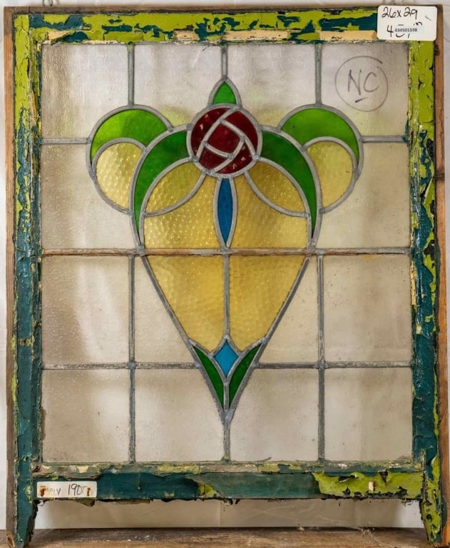 FRENCH ART NOUVEAU STAINED GLASS PANEL: French Art Nouveau stained glass panel with heart-shaped rose medallion and amber and blue accents. Approximate dimensions: h. 27", w. 29" Disclaimer: This is an online court ordered bankruptcy sale.