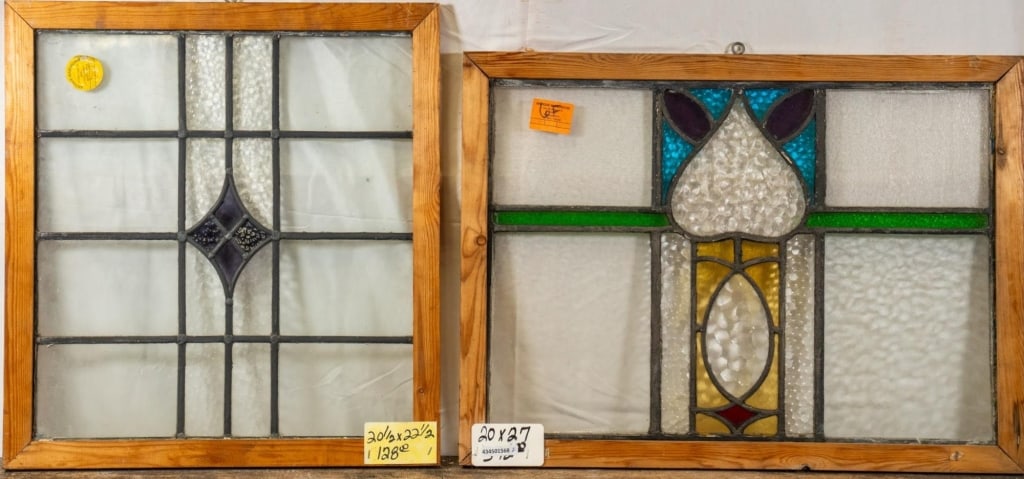 TWO CONTINENTAL STAINED GLASS PANELS: Two Continental stained glass panels. Approximate dimensions: h. 20", w. 27" Disclaimer: This is an online court ordered bankruptcy sale. Participating bidders must have a credit card on file with Liv